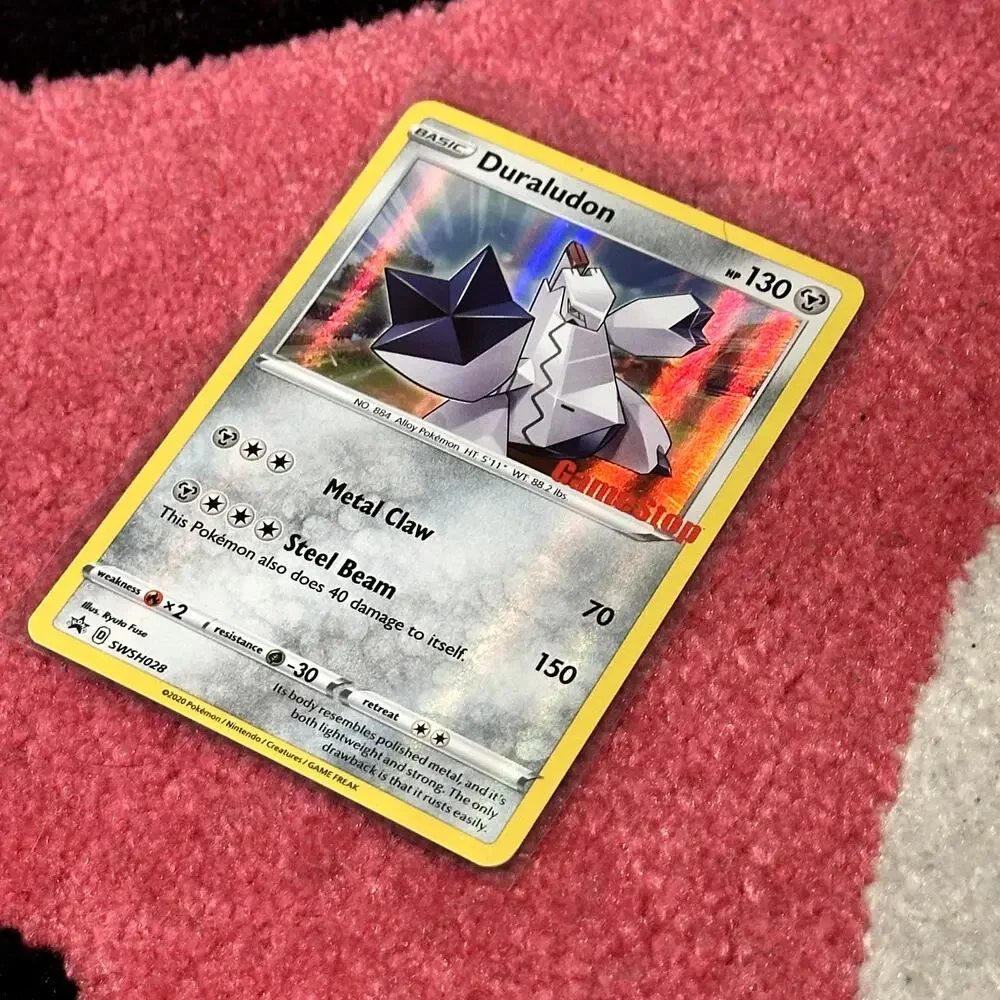 Duraludon #SWSH028 – Pokémon Promo – Stamped Holo – As Pictured